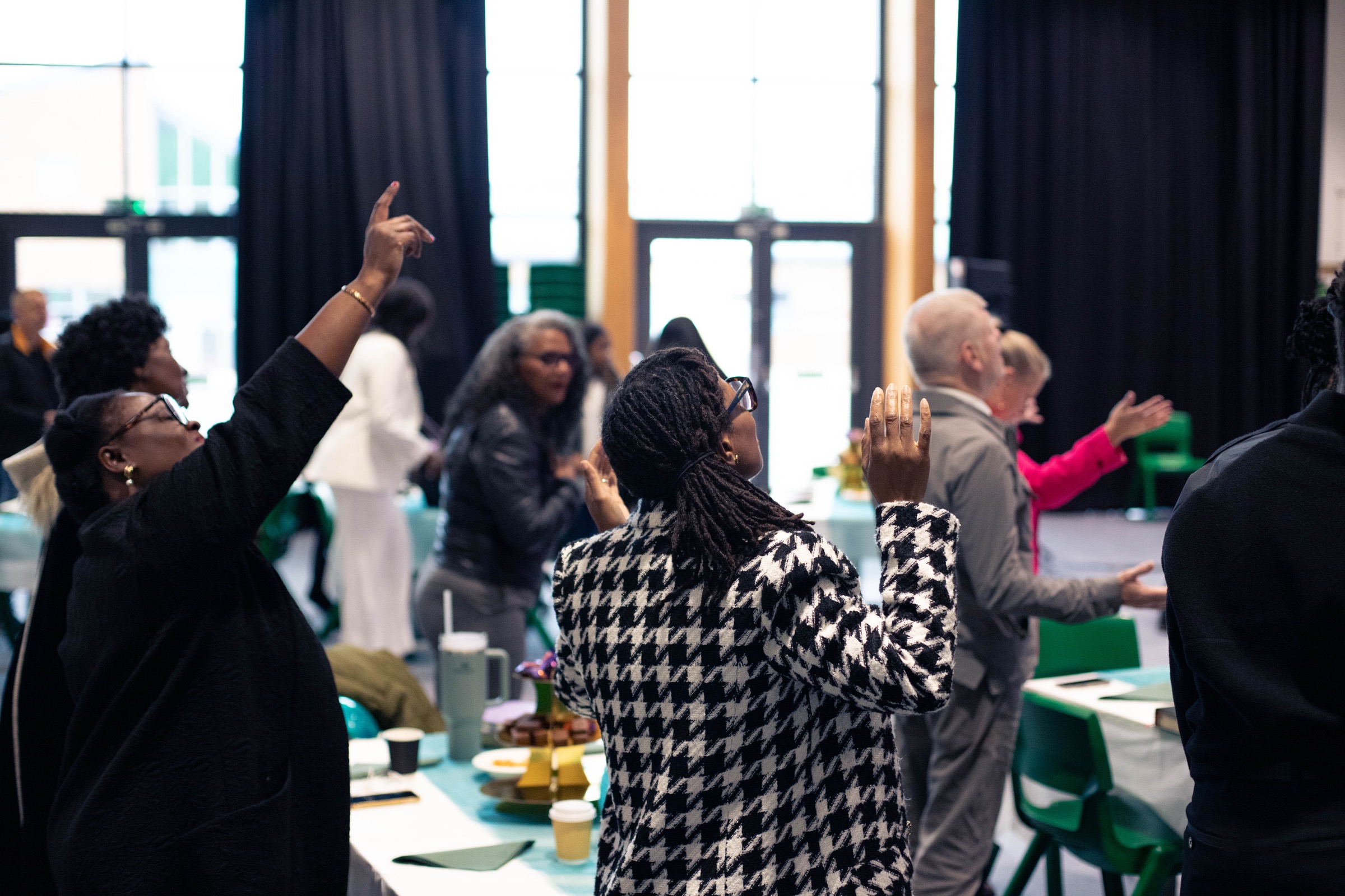 People worshipping at a church service